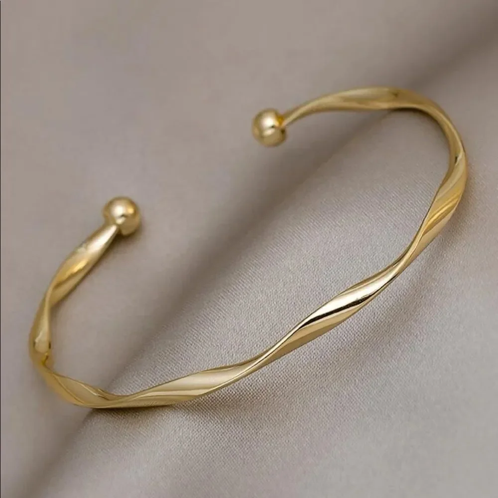 7/$30 TWISTED GOLD CUFF - Picture 2 of 5